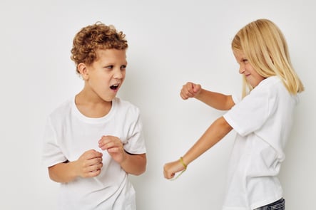 children-boy-girl-posing-white-background-real-emotions